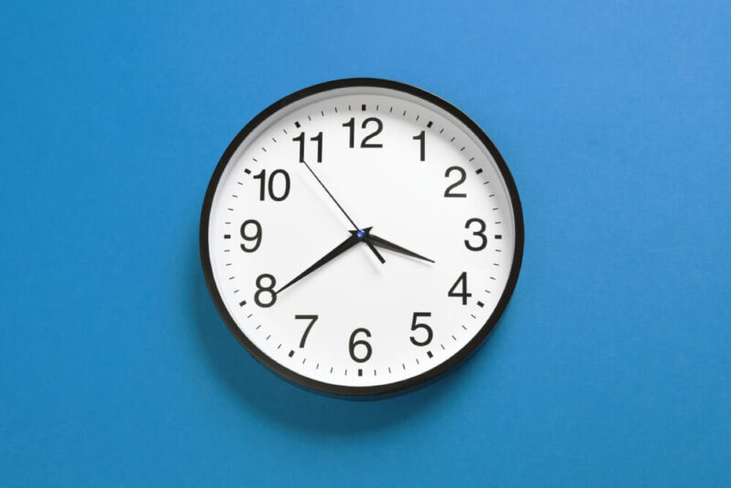 clock on the blue wall
